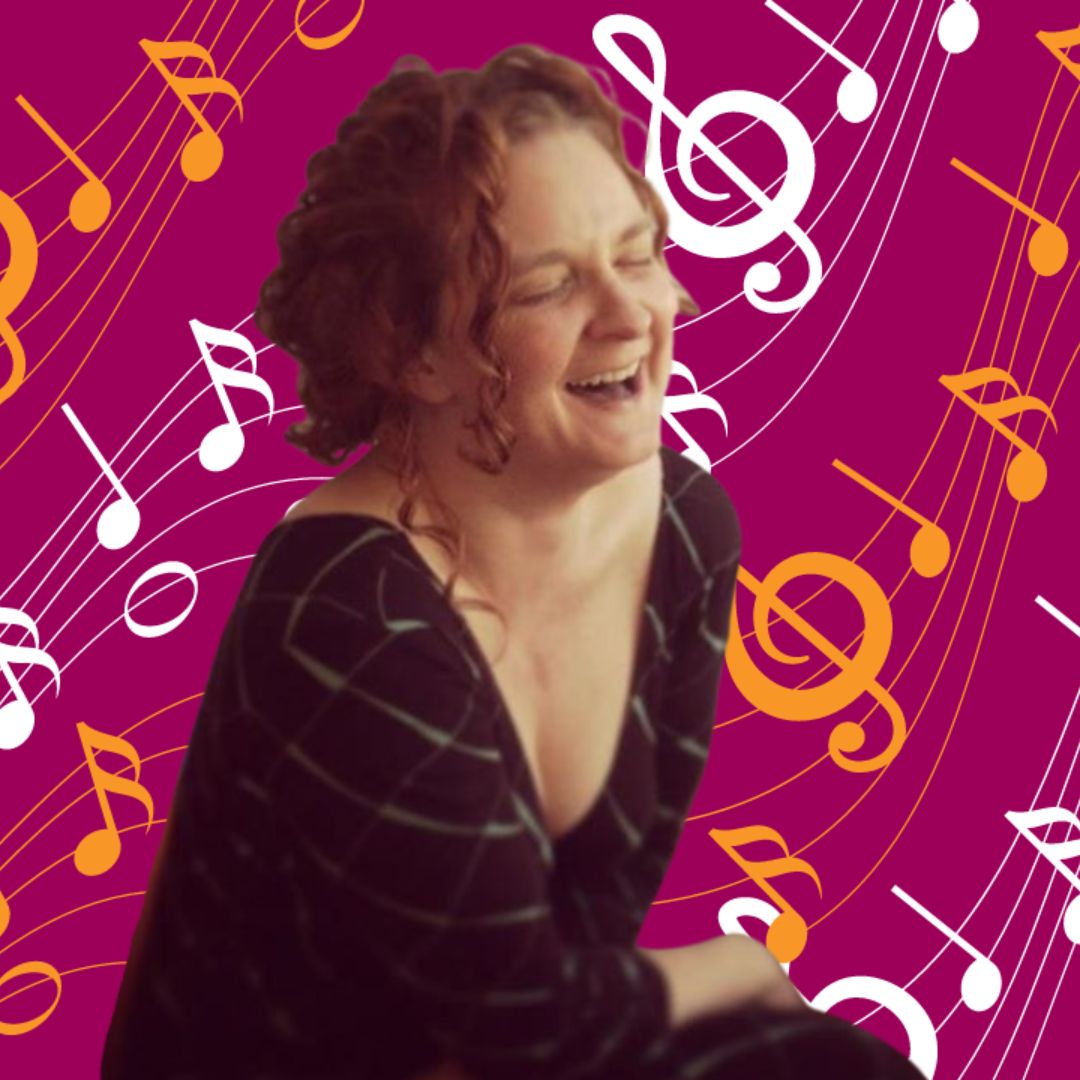 woman with curly hair laughing with a background of musical notes around her