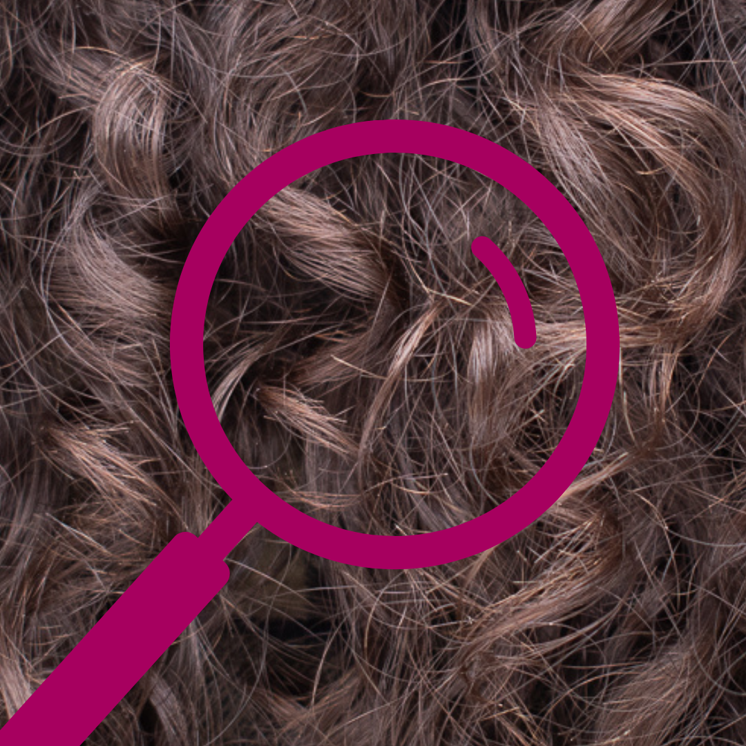 a close up of curly hair with the graphic of a magnifying glass on top