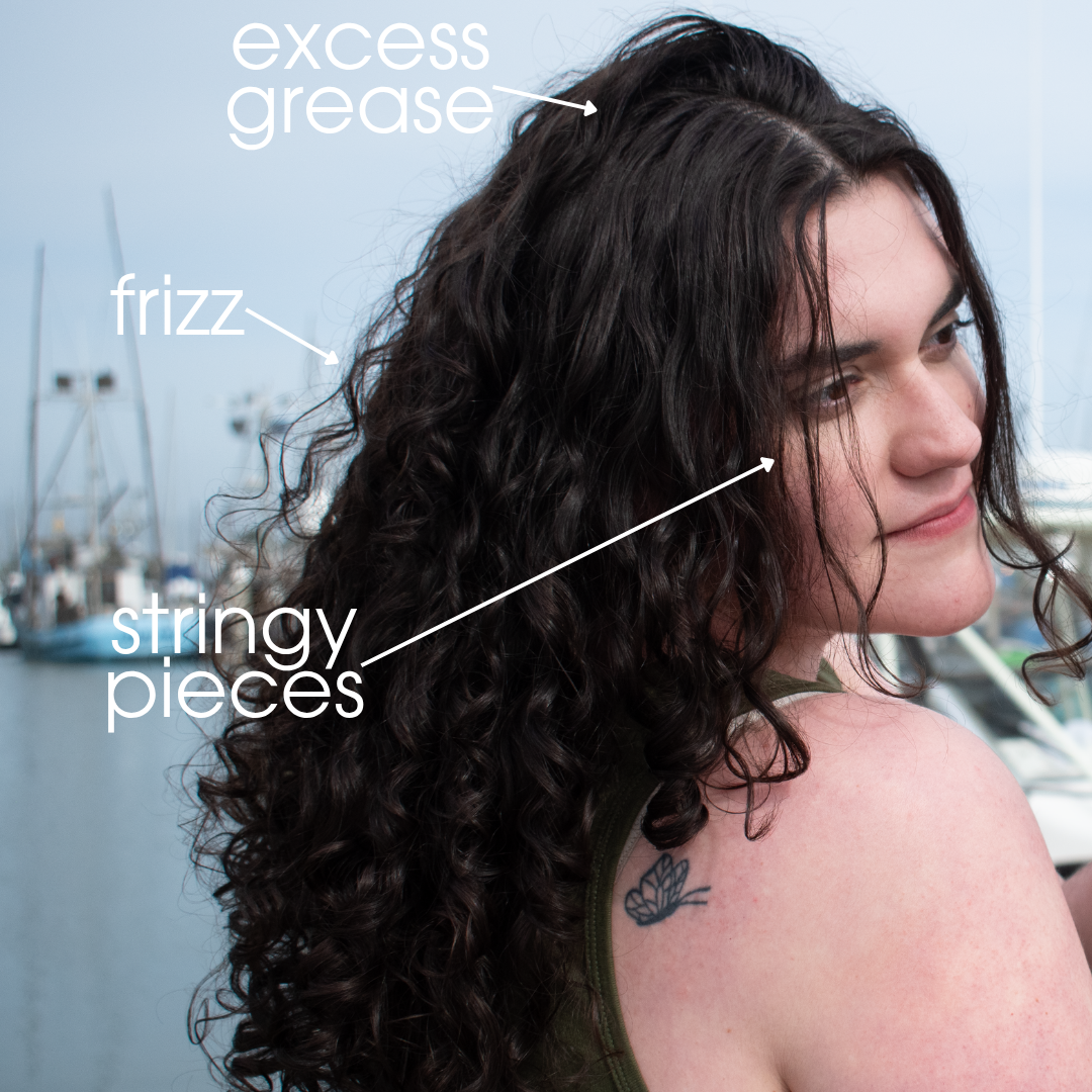 curly haired woman near the beach with overlay text that says 