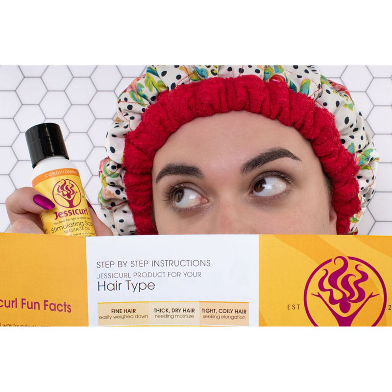 woman in heat cap holding a pamphlet over her face and a bottle of product